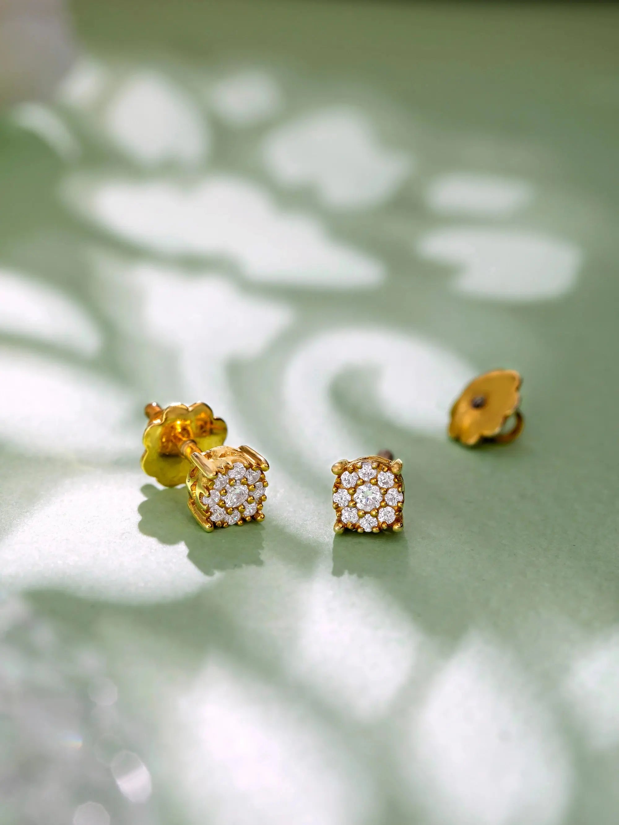 Little Flora 18K gold floral diamond earrings by AuDiam