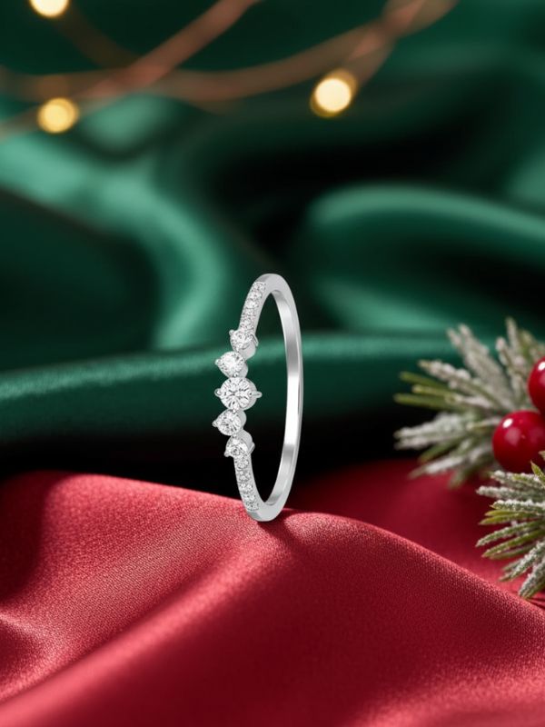 AuDiam minimalist Gen Z diamond ring – Christmas gift for her on a red satin surface with a green background