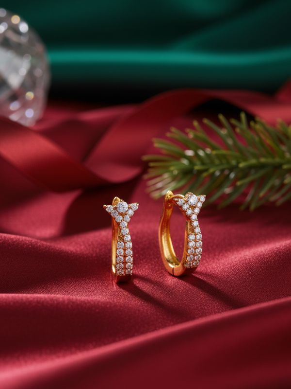 18K gold AuDiam diamond hoops – Christmas gift for her on a red fabric background